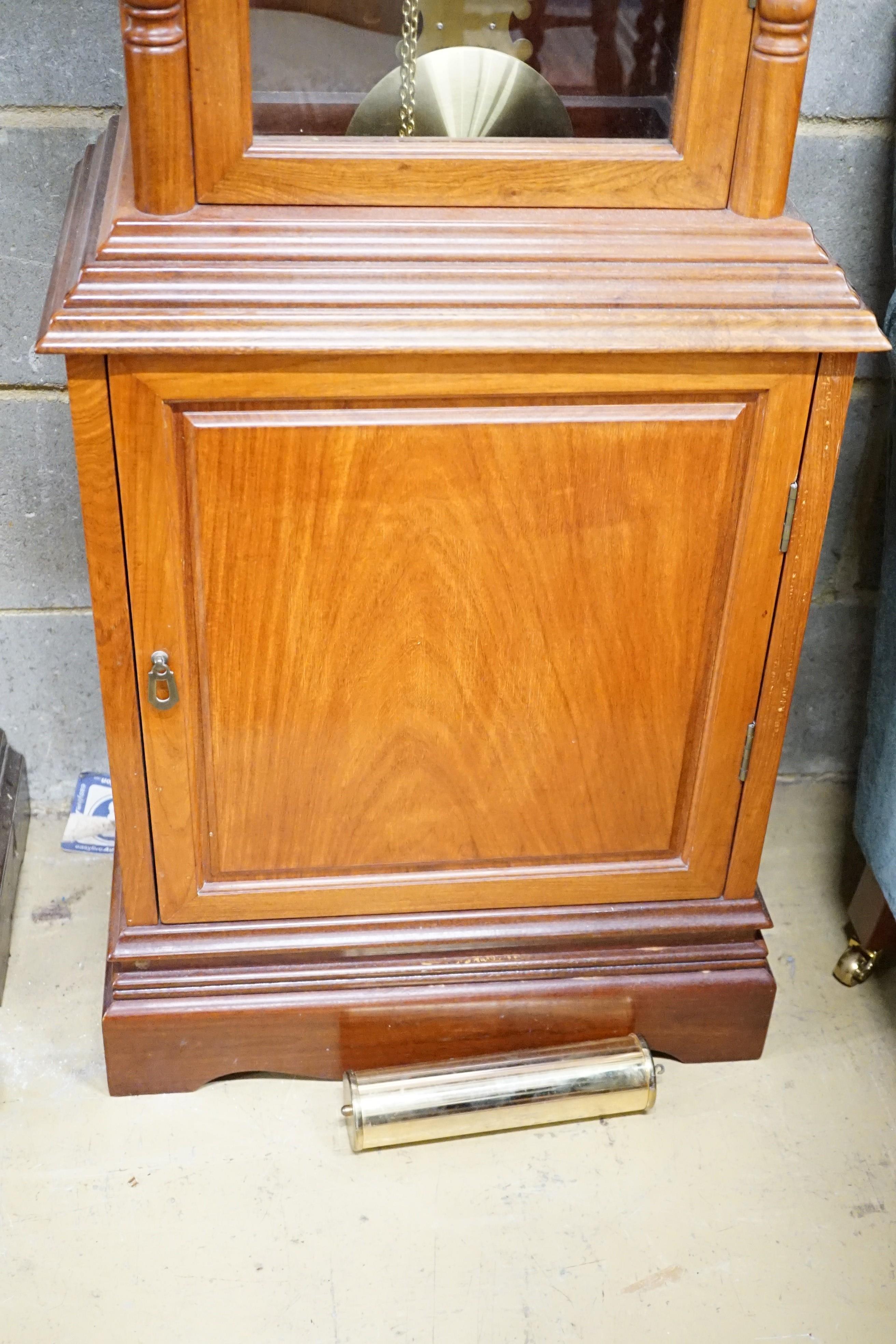 A Moathe padouk cased eight day longcase clock, height 220cm